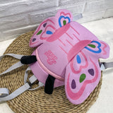 pink butterfly shaped backpack with wings