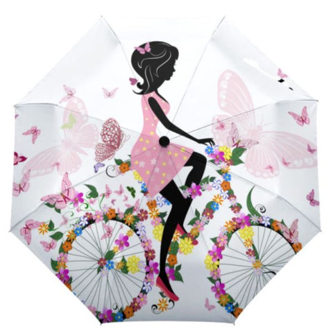 butterfly umbrella with cycling woman
