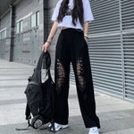 hollow butterfly streetwear pants with a woman wearing a backpack