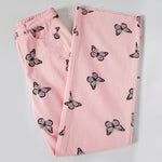 folded pink butterfly trousers
