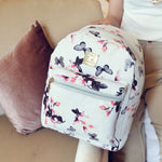 white butterfly travel backpack