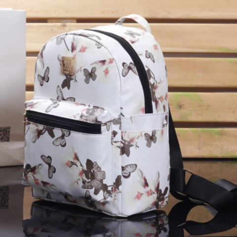 white butterfly backpack