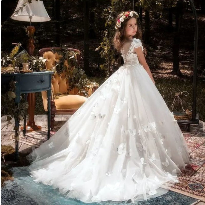 butterfly dress white Floral Lace A Line Ivory it is made from illusion tulle fabric featuring a beautifully hand beaded and sewn intricate butterfly detailing throughout Butterfly Oasis Gown Teuta Matoshi