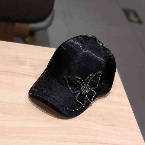 black abstract butterfly cap