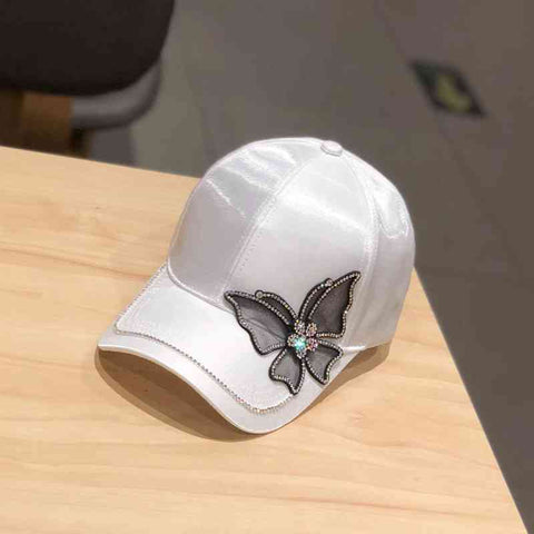 white abstract butterfly cap front view