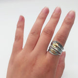 feather butterfly ring on finger