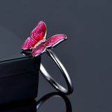 silver and pink butterfly ring design