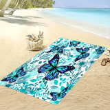 Aqua Floral Monarch Bath Towel on the beach