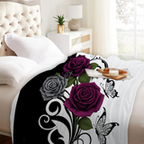 Monochrome Swallowtail Floral Blanket on a bed