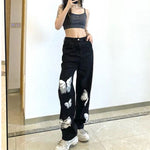white butterfly wide leg jeans