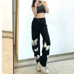 white butterfly baggy jeans