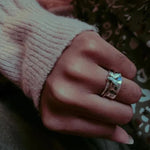 antique butterfly spinner ring on finger