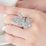big sterling silver butterfly ring on finger