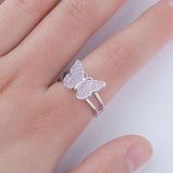lavender pink butterfly ring on finger